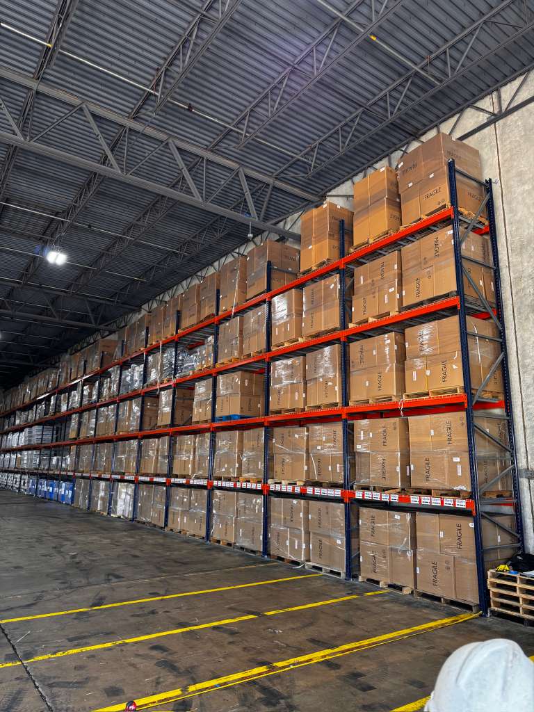 Selective pallet racks fully loaded — Orozco's Racks installation in South Texas