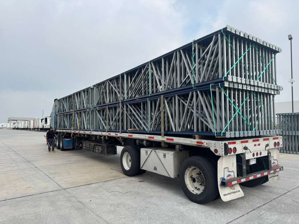 Full truckload of rack frames on flatbed trailer